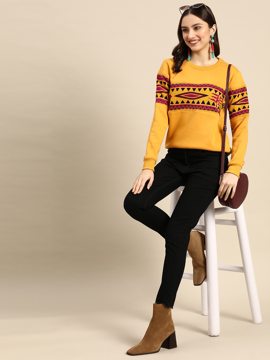 

Sangria Women Mustard Yellow & Magenta Geometric Sweatshirt