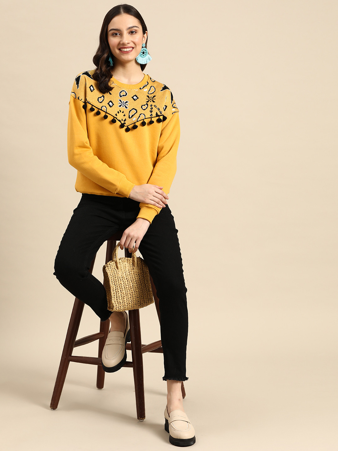 

Sangria Women Mustard Yellow & Black Geometric Sweatshirt