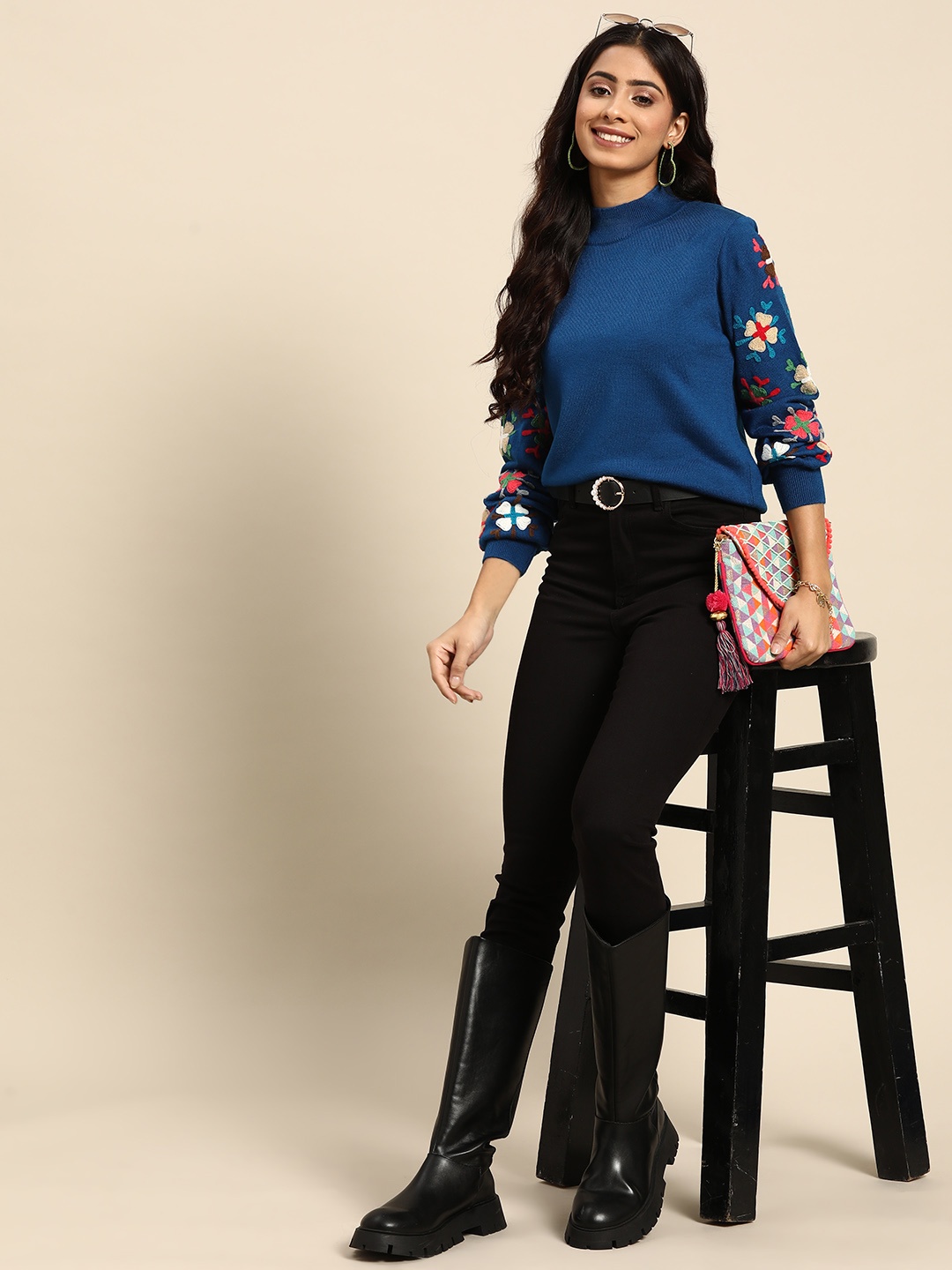 

Sangria Women Blue Pullover with Embroidered Detail