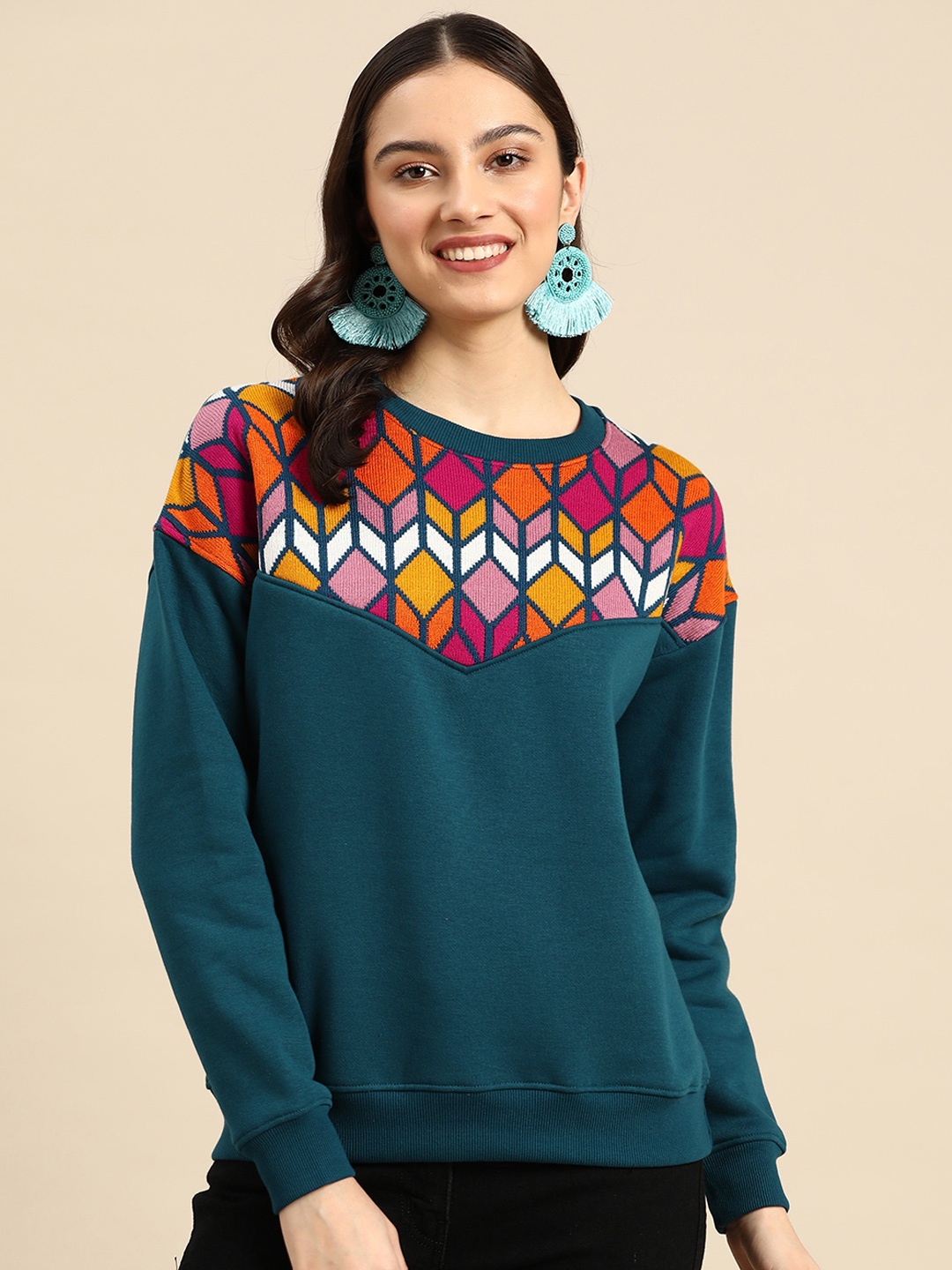 

Sangria Women Teal Green & Magenta Geometric Sweatshirt