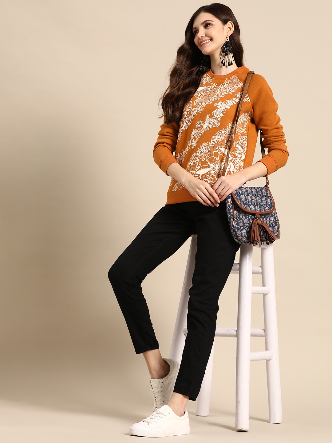 

Sangria Women Round Neck Knitted Printed Sweatshirt, Orange