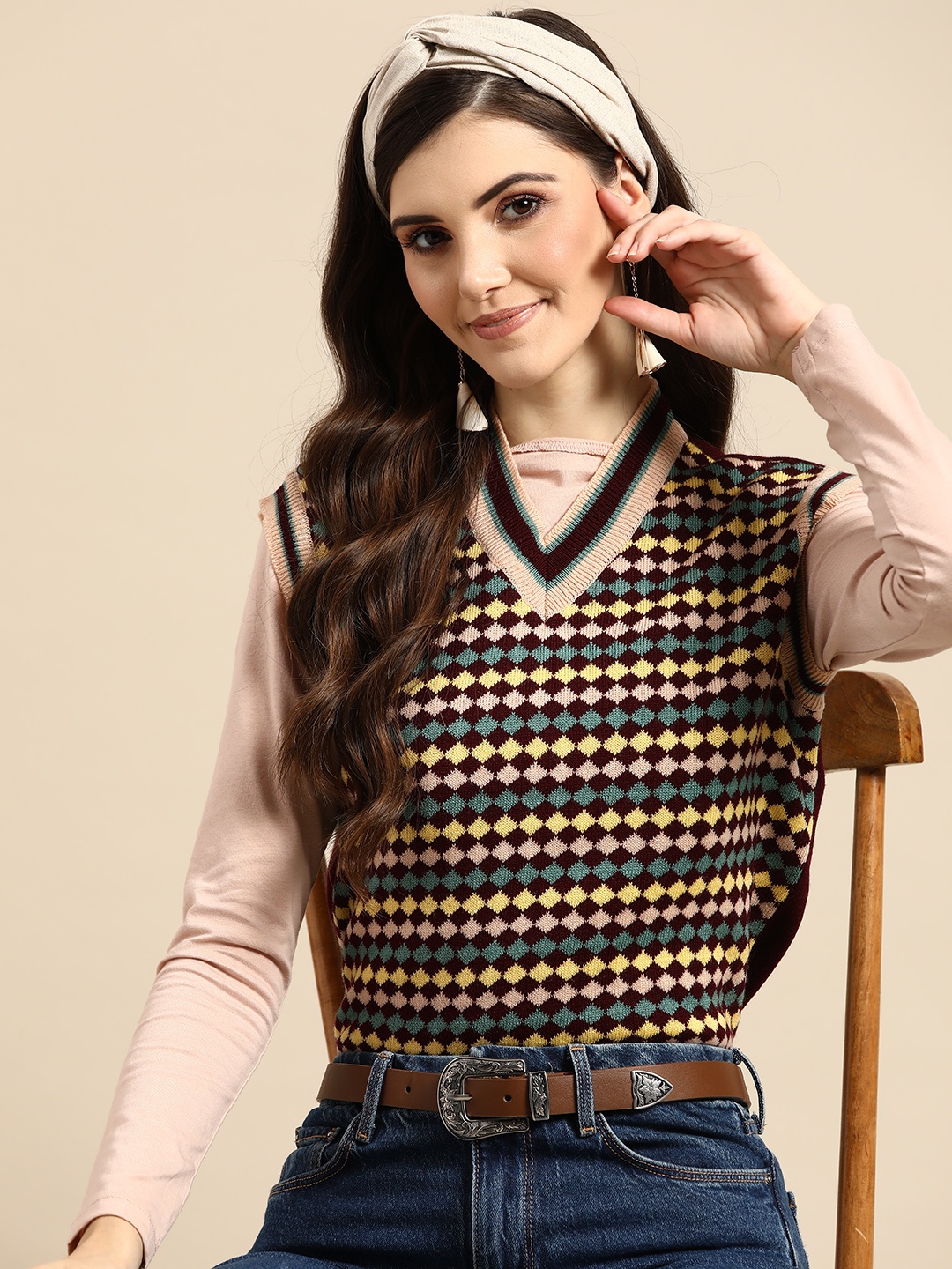 

Sangria Women Maroon & Yellow Checked Printed Sweater Vest