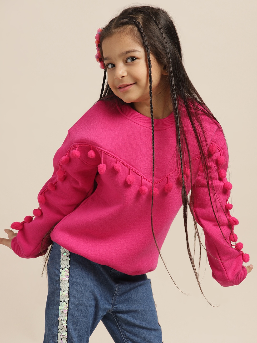 

Sangria Girls Pink Solid Round Neck Sweatshirt With Pom-Pom Detail