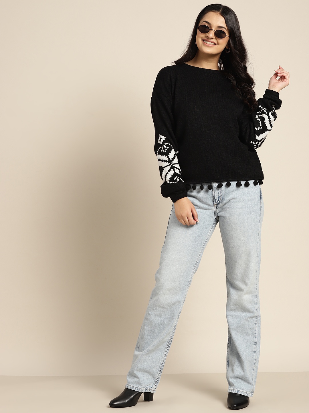

Sangria Teen Girls Black & White Solid Pullover with Pom-Pom Fringed Hem Detail