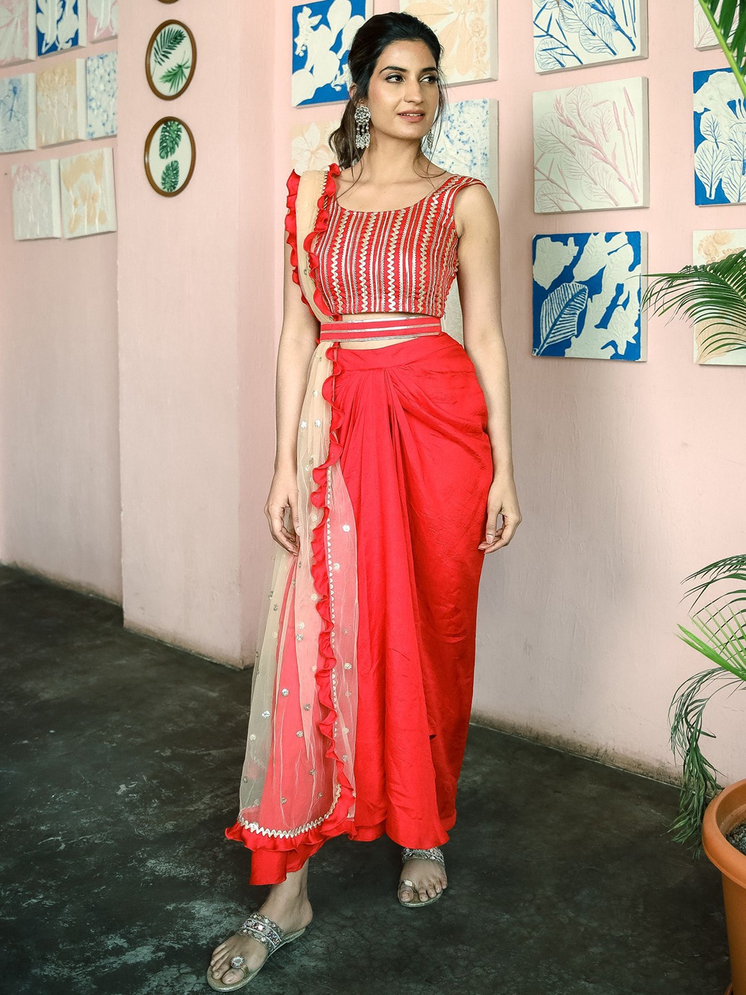 

Lavanya The Label Red Woven Design Embroidered Half and Half Saree