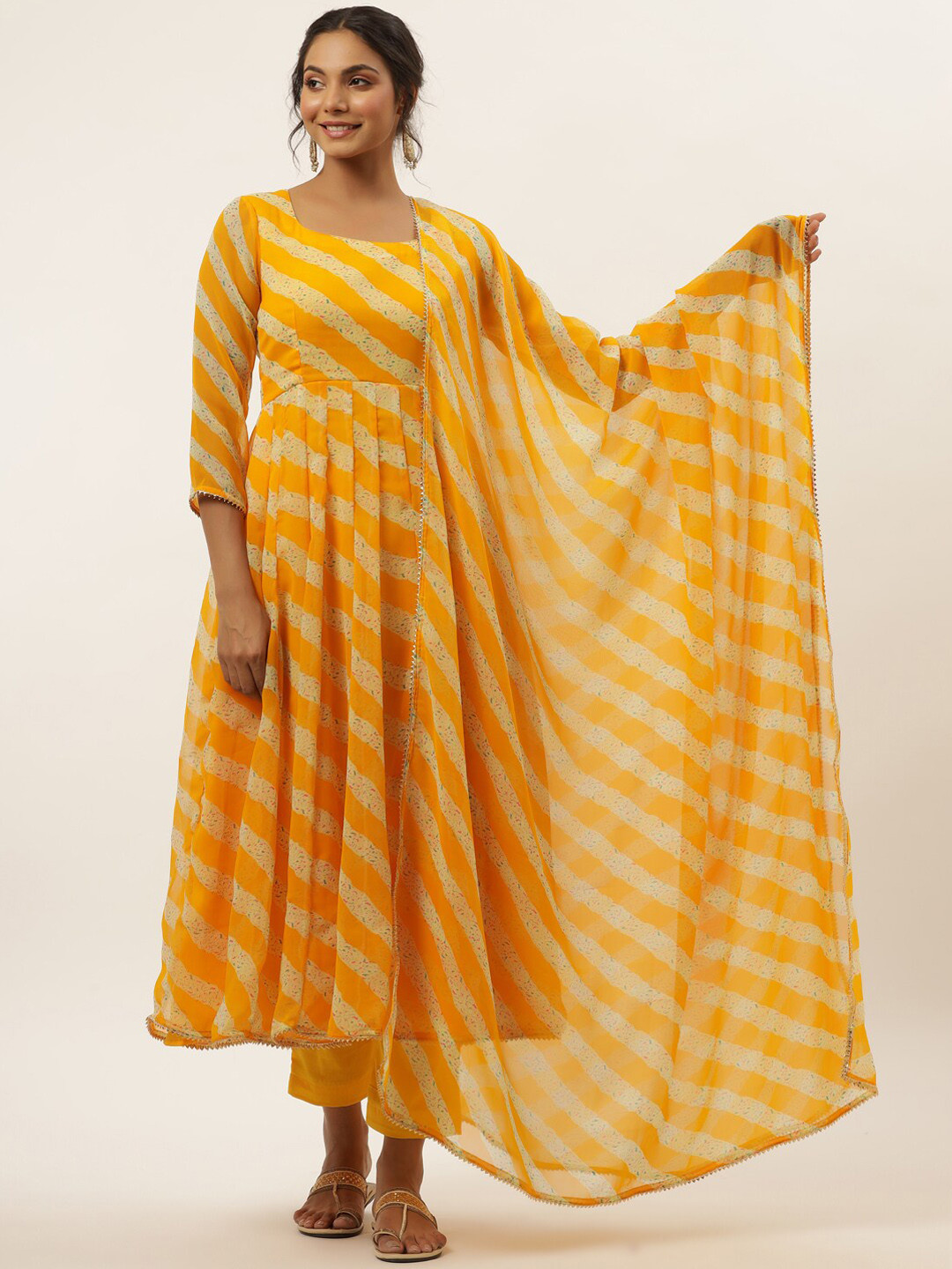 

HOUSE OF JAMOTI Women Yellow Striped Empire Silk Georgette Kurti with Trousers & With Dupatta