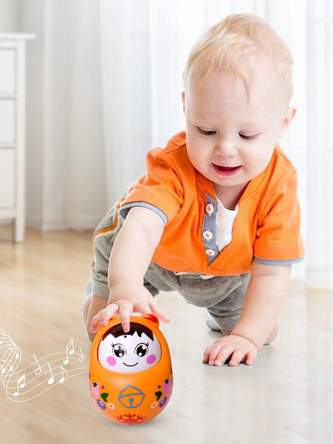 

WEMBLEY Orange & Black Roly Poly Push & Shake Wobbling Bell Sounds Tumbler Doll Toy