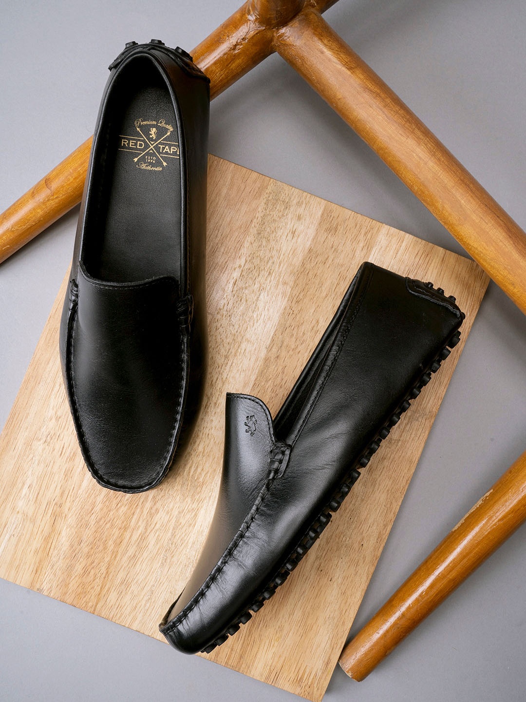 

Red Tape Men Black Solid Leather Formal Slip On Shoes