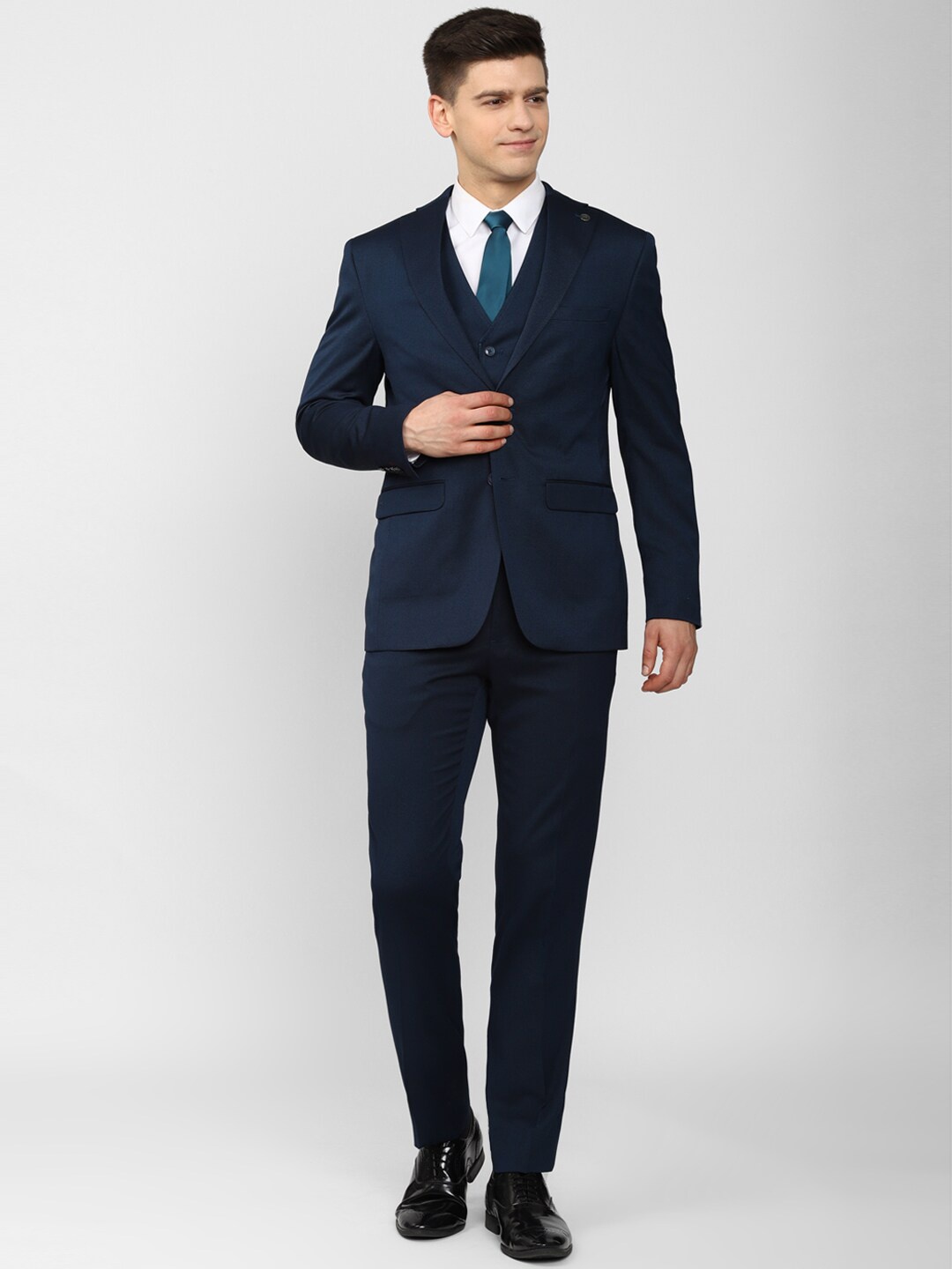 

Peter England Elite Men 3 Piece Navy Blue Printed Suits