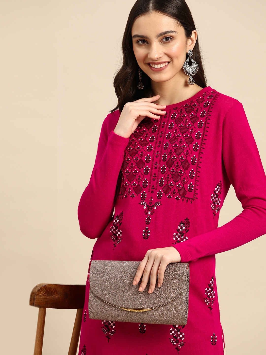 

Sangria Women Pink & Black Ethnic Motifs Acrylic Straight Winter Kurta