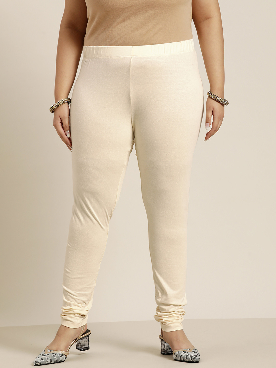

Sztori Women Plus Size Cream-Colored Solid Churidar Length Leggings