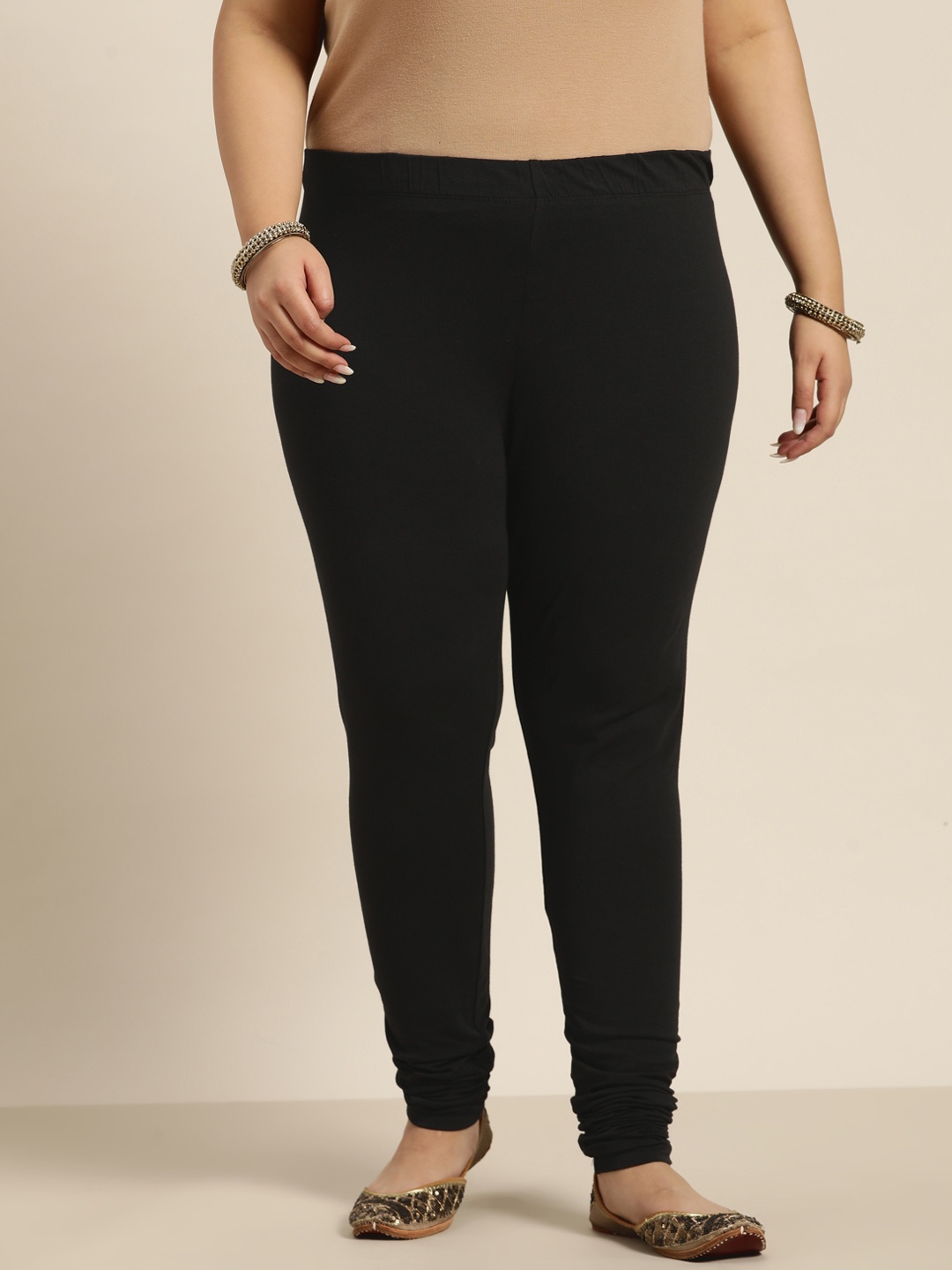 

Sztori Women Plus Size Black Solid Churidar Leggings