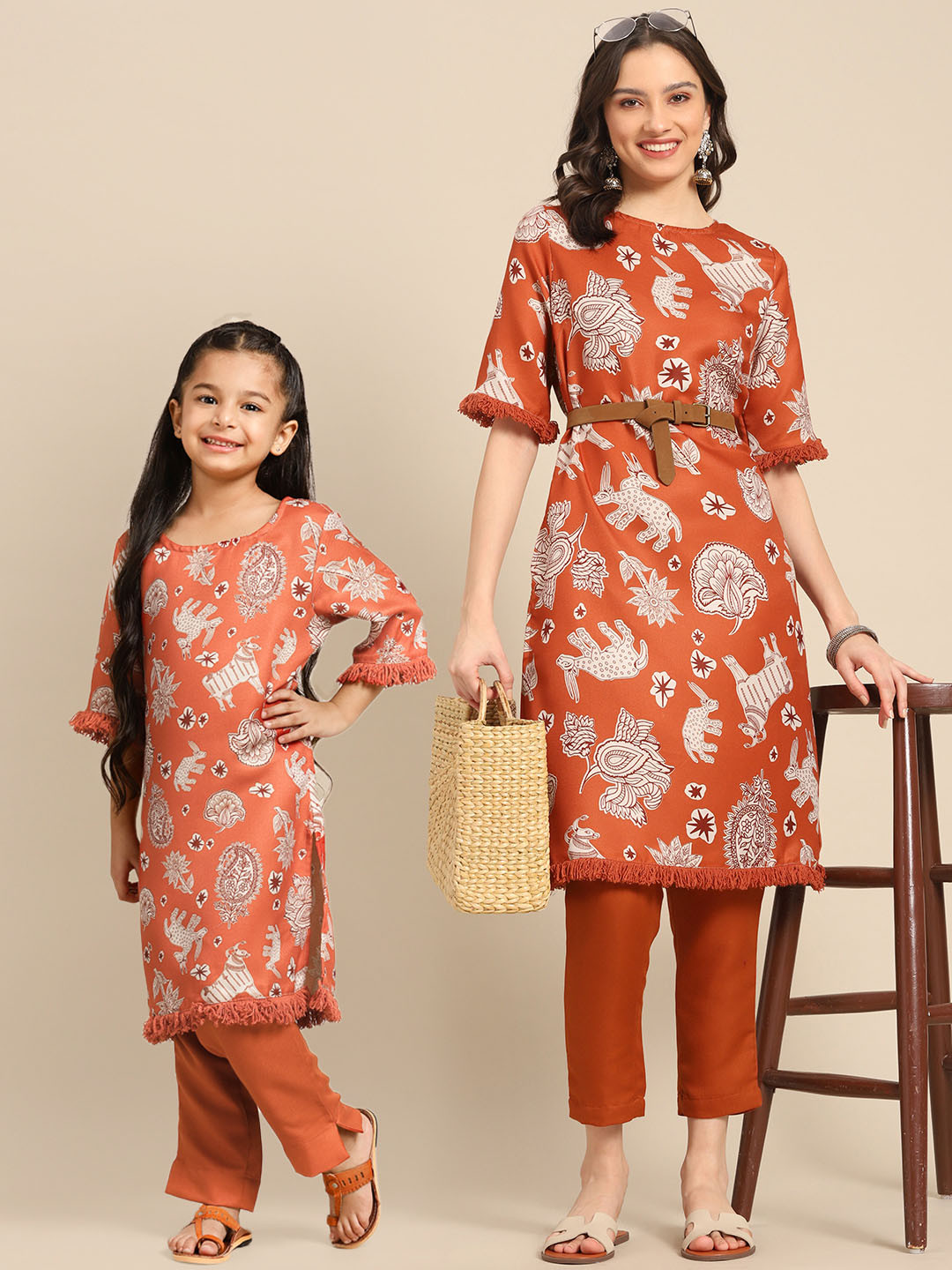 

Sangria Girls Rust Orange & Off White Ethnic Motifs Print Cotton Kurta with Trousers