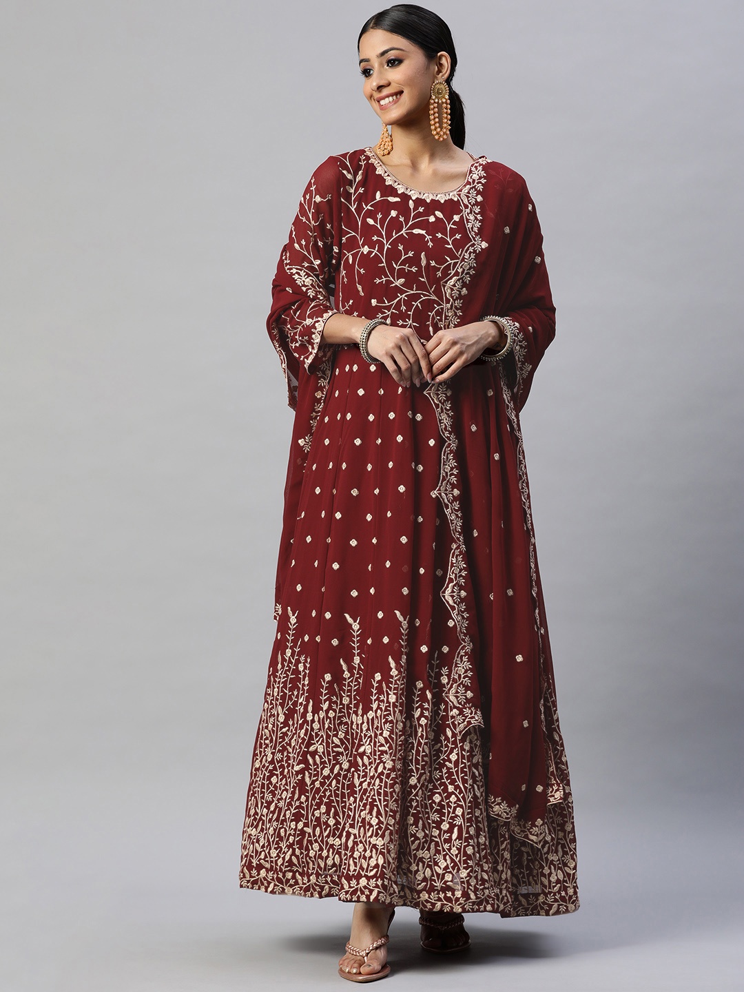 

Readiprint Fashions Maroon & Golden Embroidered Semi-Stitched Dress Material