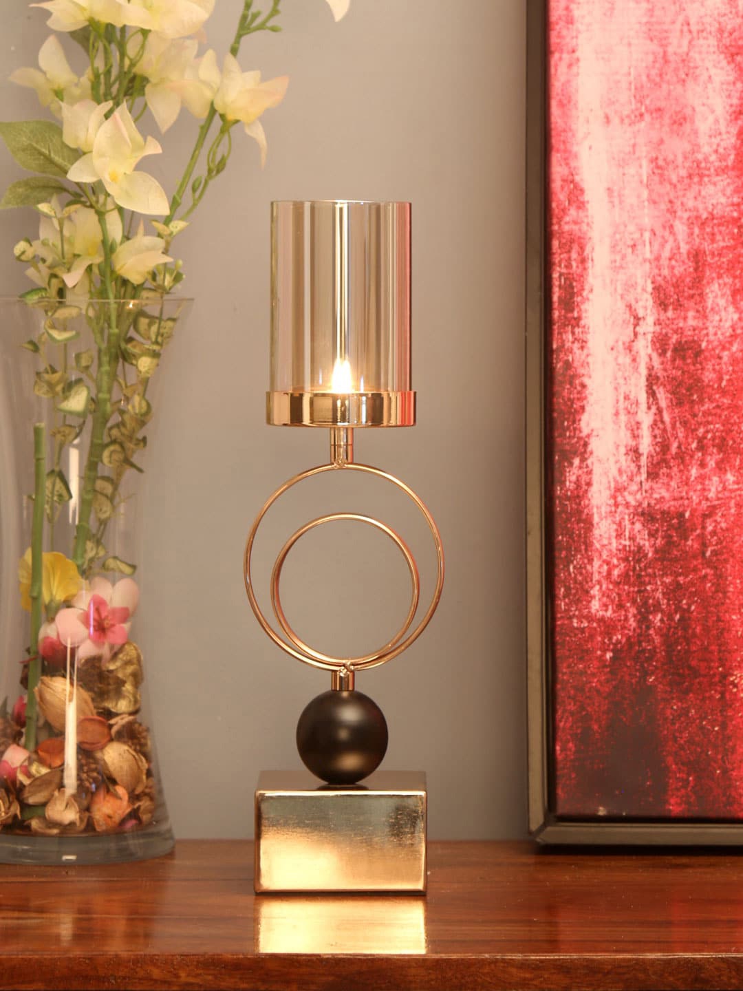 

Athome by Nilkamal Gold Toned & Black Solid Glass Ringlets Candle Stand