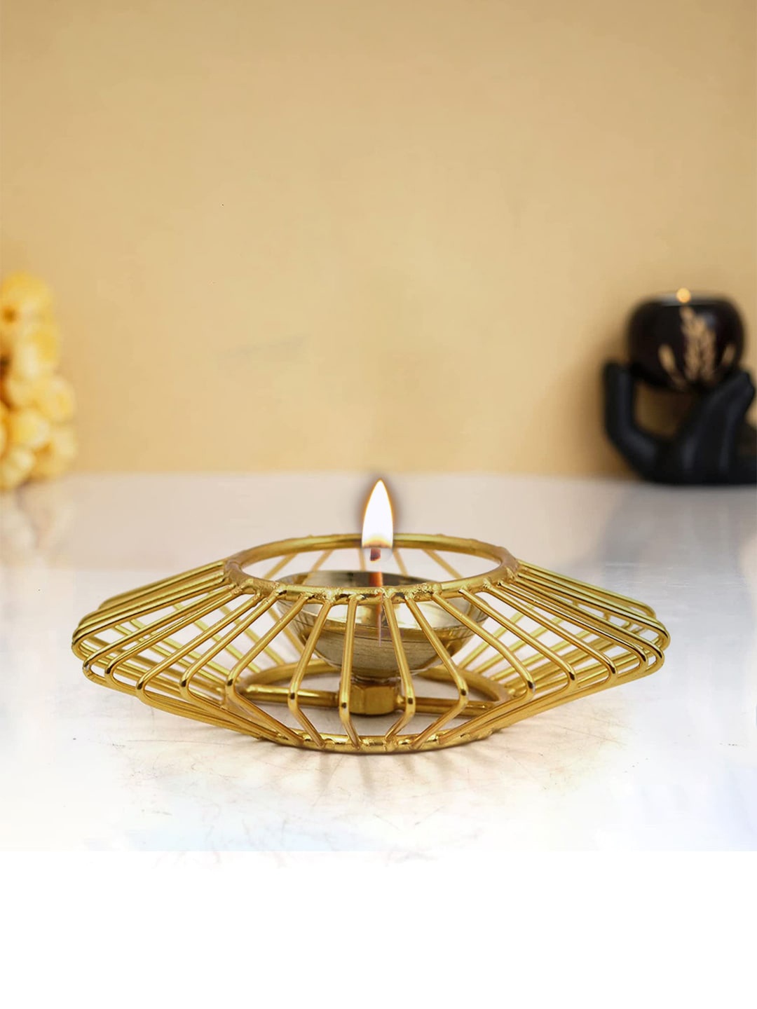

CraftVatika Gold-Toned Decorative Akhand Brass Diya