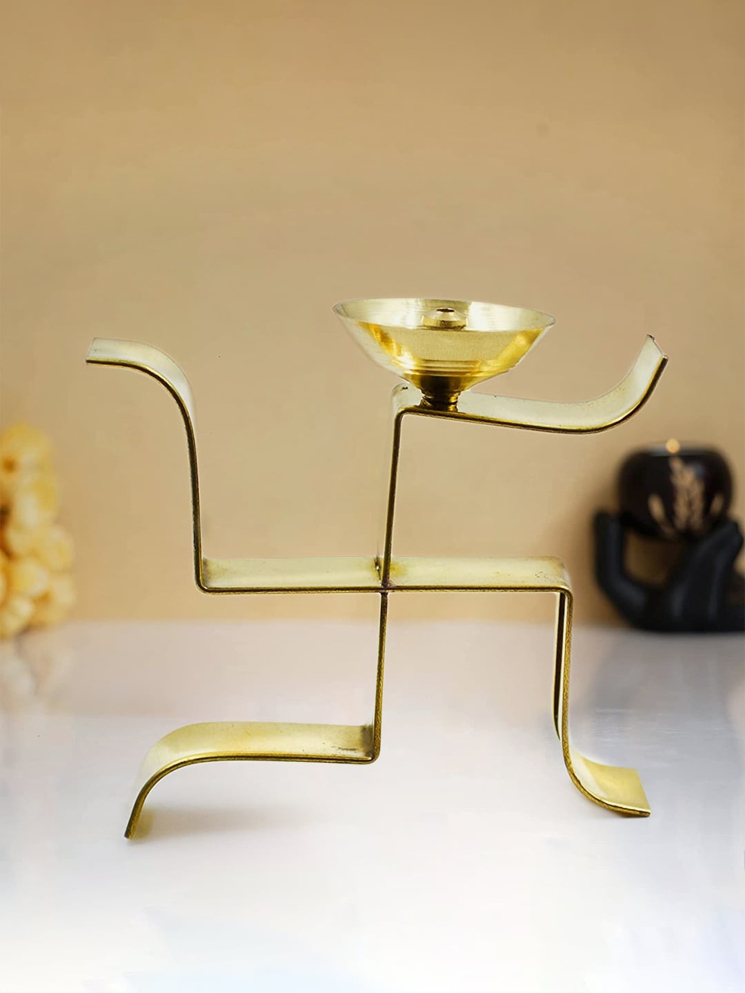 

CraftVatika Gold-Toned Swastik Symbol Brass Diya Oil Lamp Stand