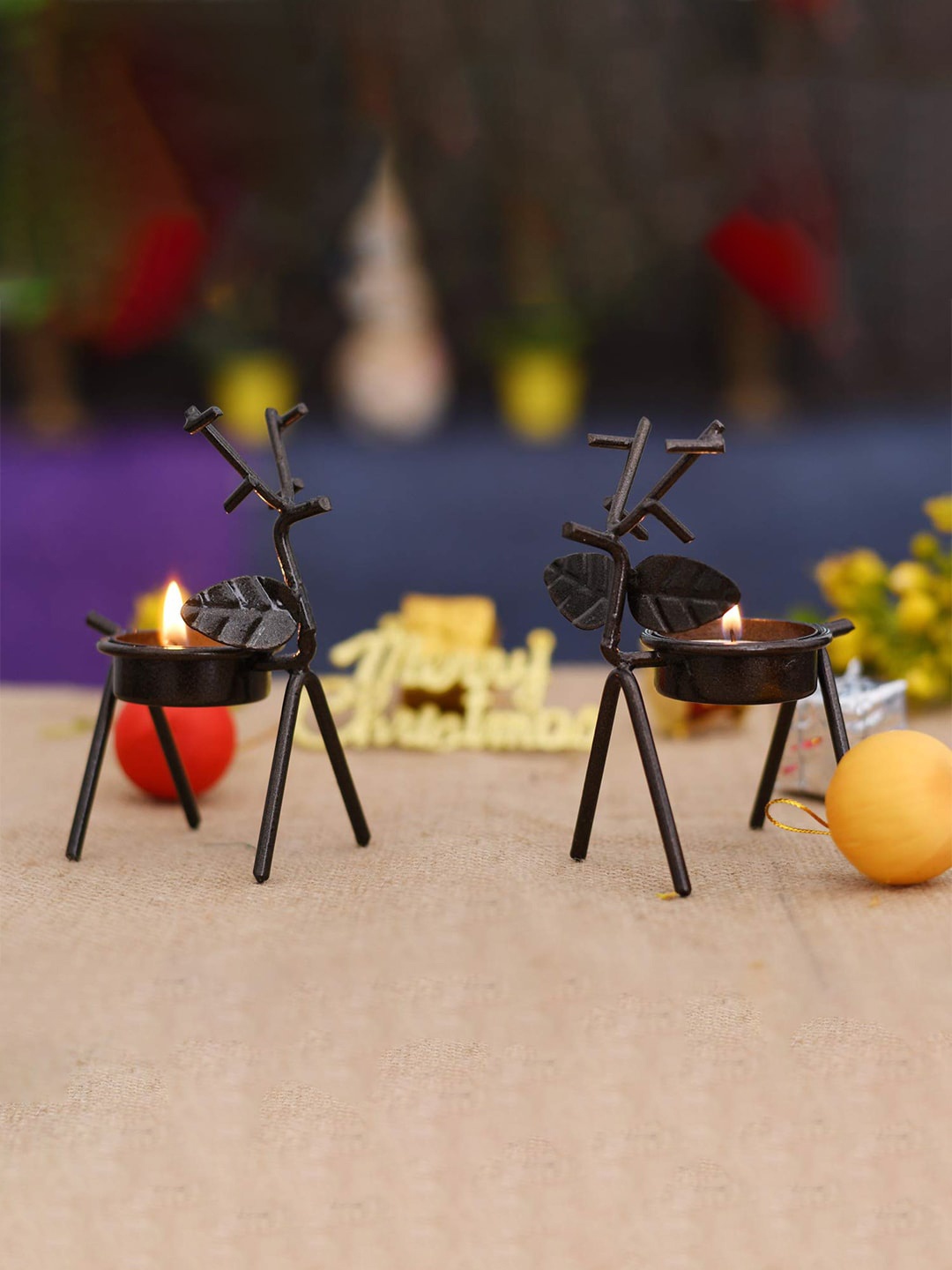 

Craftvatika Pack of 2 Black Cast Iron Reindeer Tealight Candle Holder