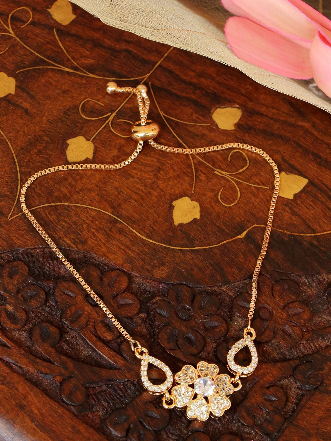 

Crunchy Fashion Women Gold-Toned & White AD Studded Bracelet