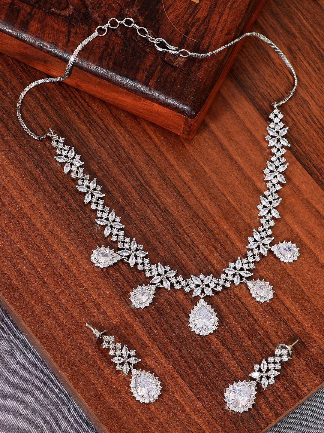 

Crunchy Fashion Silver-Plated White American Diamond Studded Jewellery Set