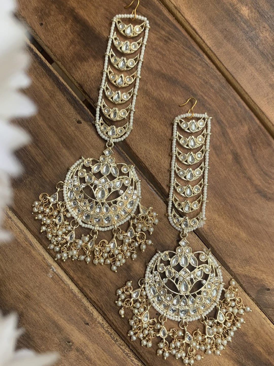

Ishhaara White Kundan Studded Contemporary Drop Earrings