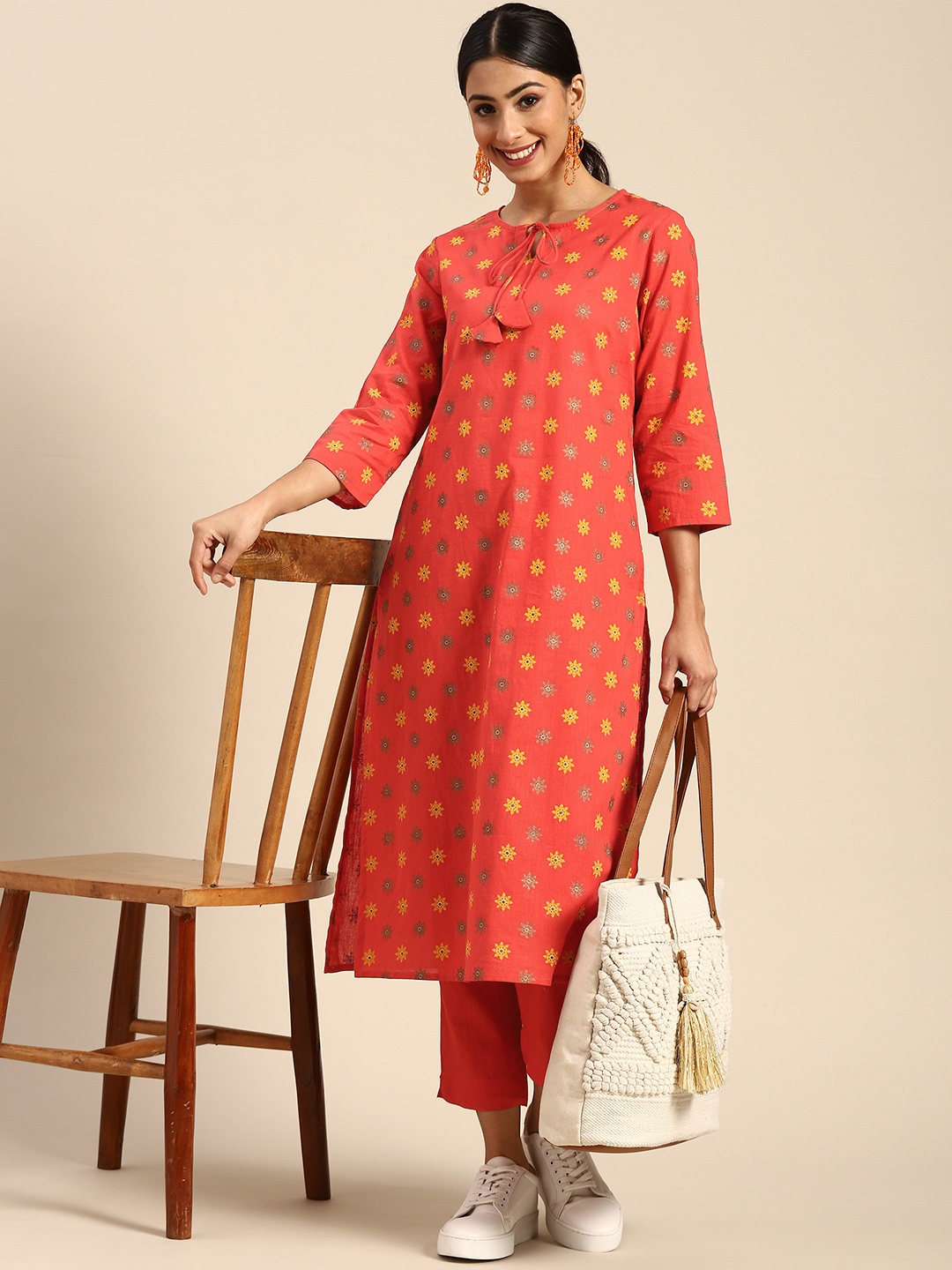 

Sangria Women Coral Red Pure Cotton Ethnic Motifs Printed Kurta with Trousers