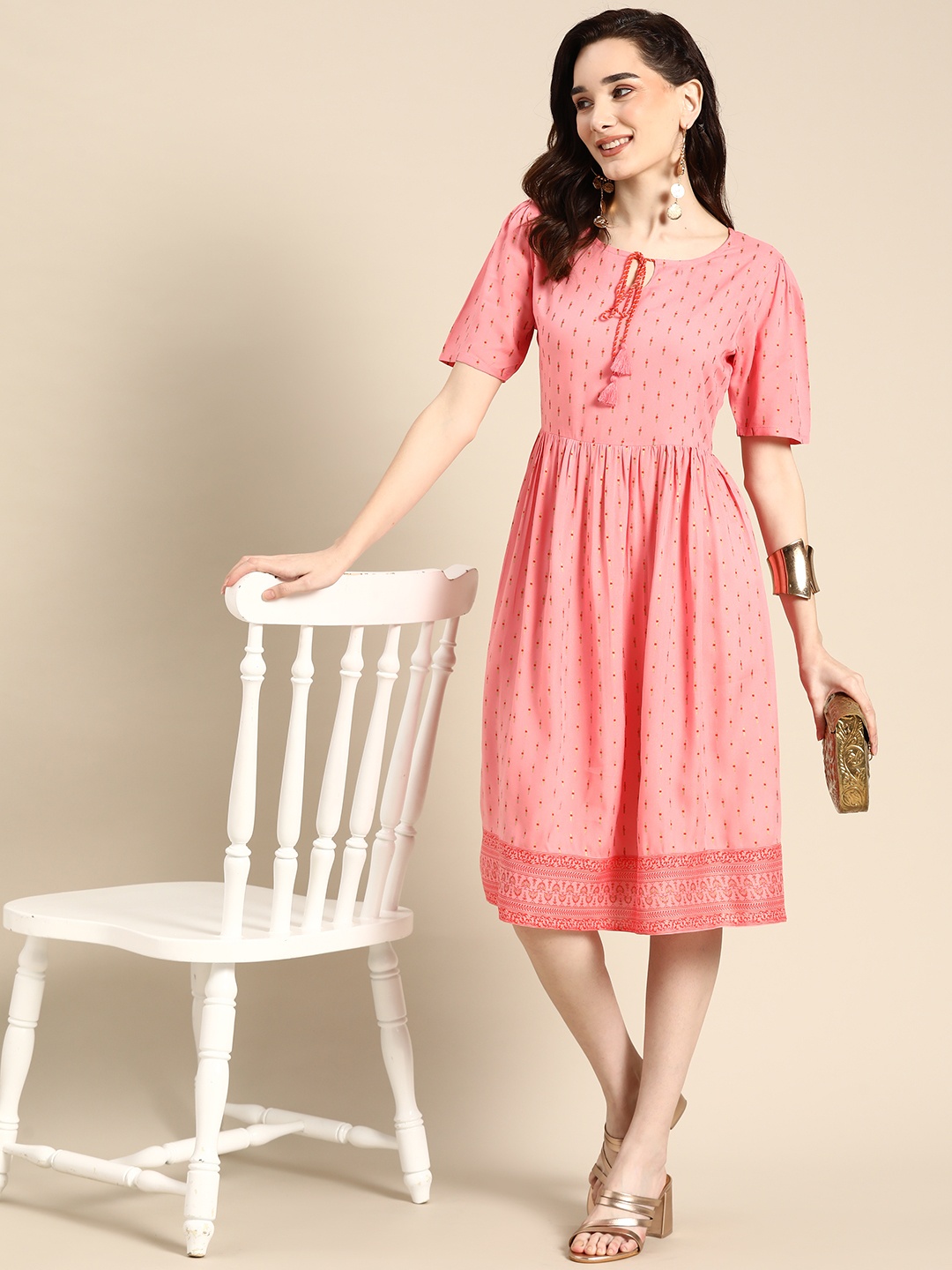 

Sangria Peach-Coloured Ethnic Motifs Printed A-Line Midi Dress