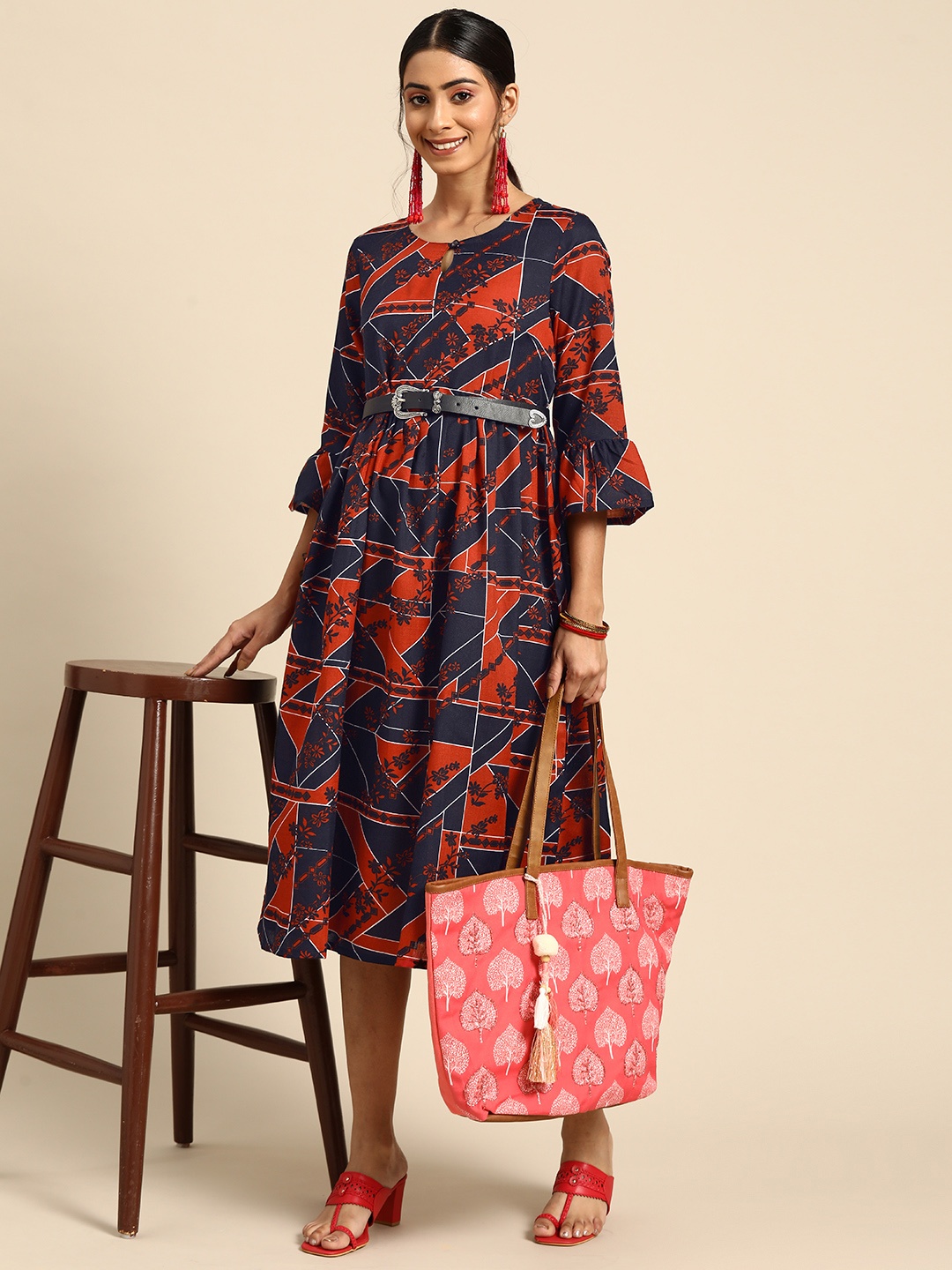 

Sangria Women Navy Blue & Rust Orange Printed Bell Sleeves A-Line Ethnic Dress
