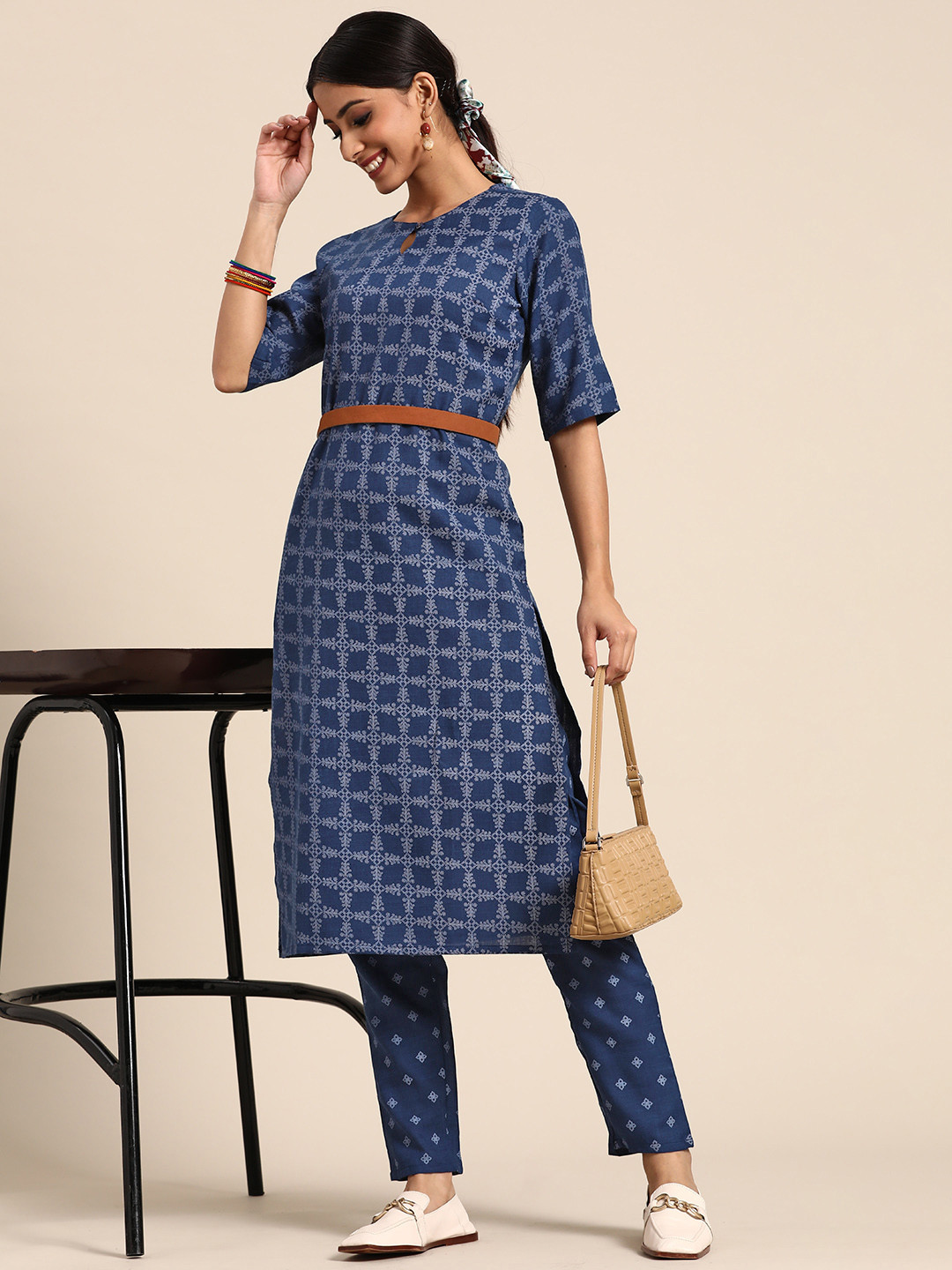 

Sangria Women Navy Blue Ethnic Motifs Printed Kurta with Trousers