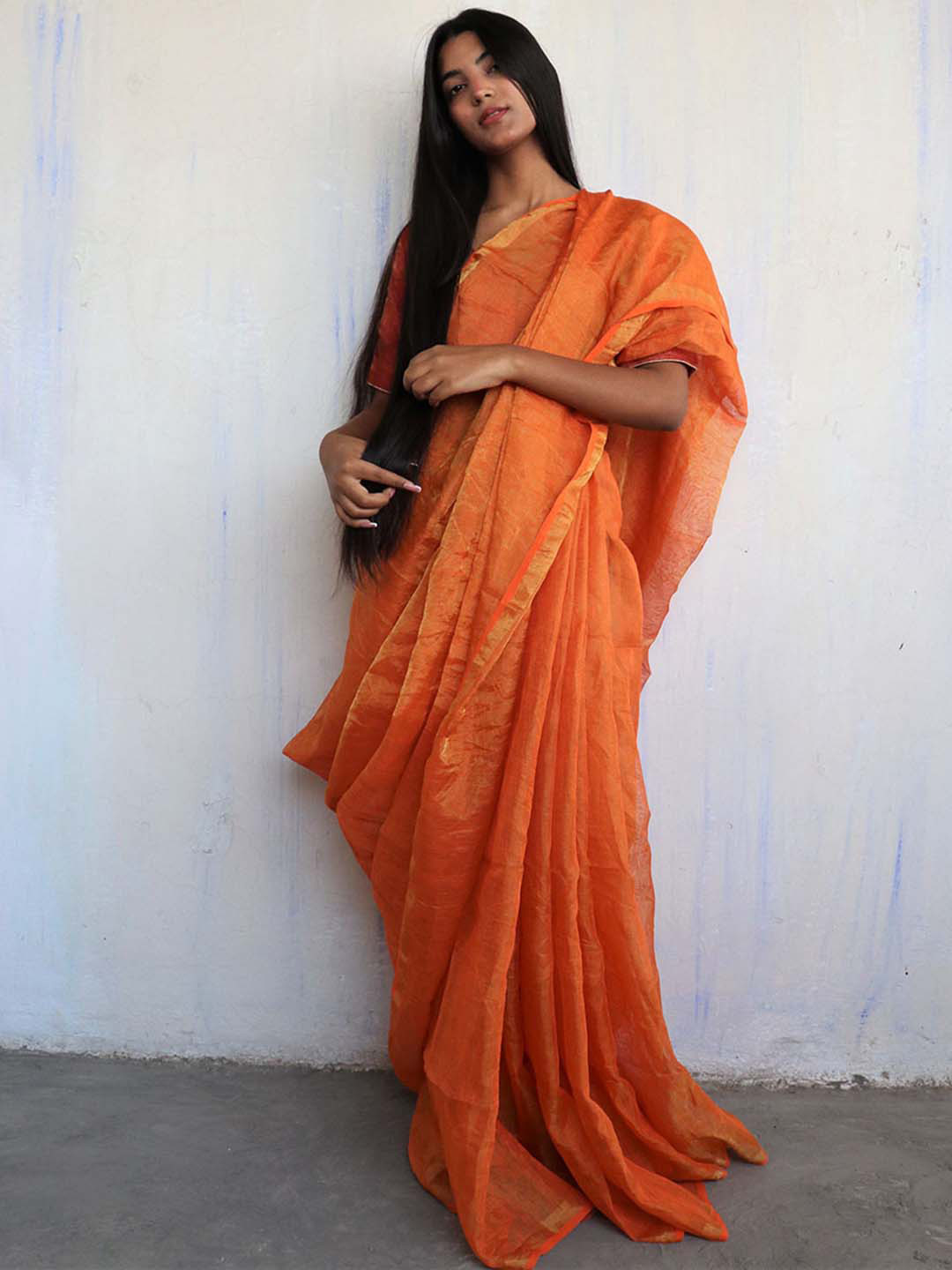 

Chidiyaa Orange Pure Linen Saree