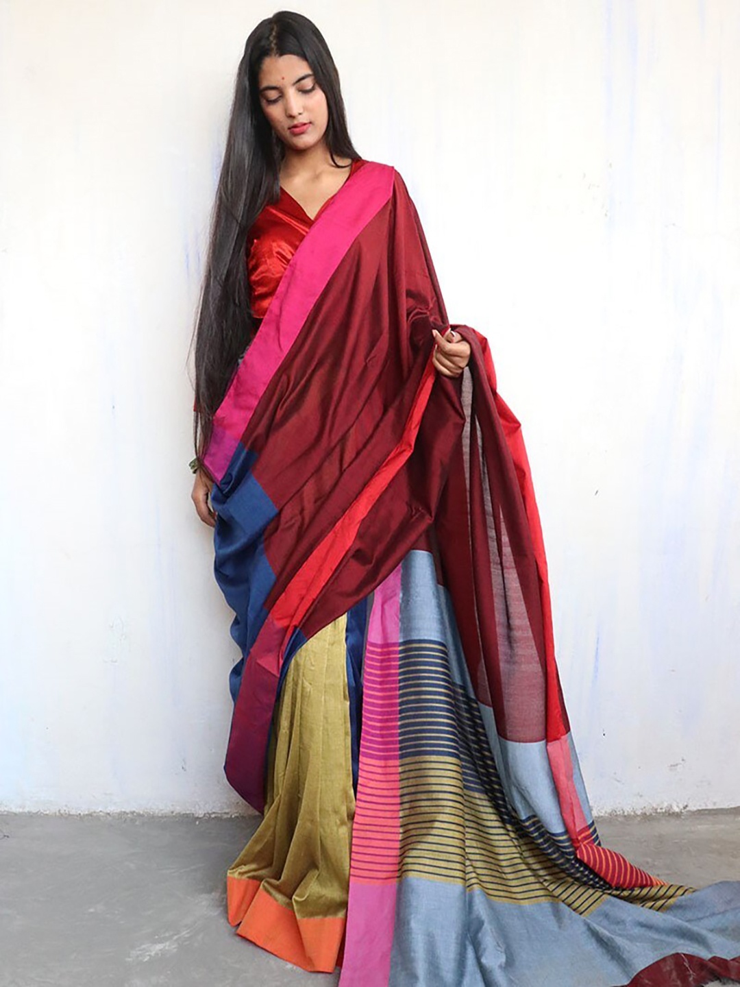 

Chidiyaa Maroon & Blue Colourblocked Zari Saree