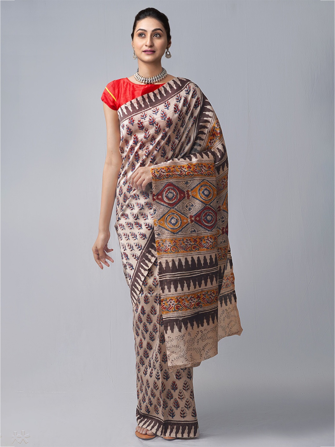 

Unnati Silks Beige & Orange Kalamkari Silk Cotton Chanderi Saree