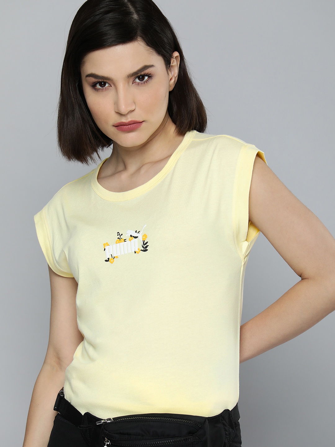 

Puma Women Yellow Typography Printed Relaxed Fit Extended Sleeves T-shirt