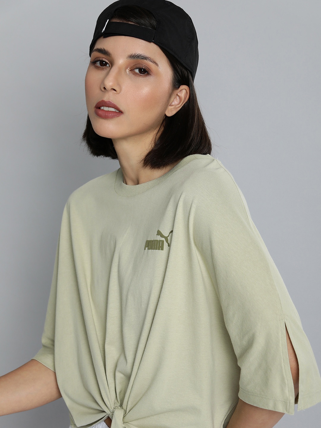 

Puma Women Olive Green Relaxed Fit Knotted Style Extended Sleeves T-shirt