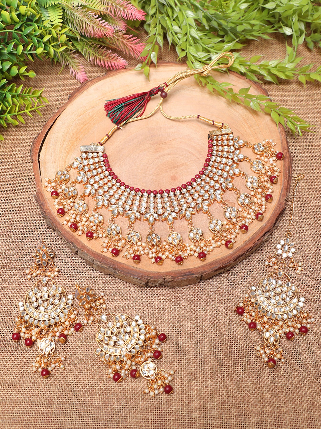 

Swarajshop Gold-Plated Maroon & White Kundan-Studded Jewellery Set