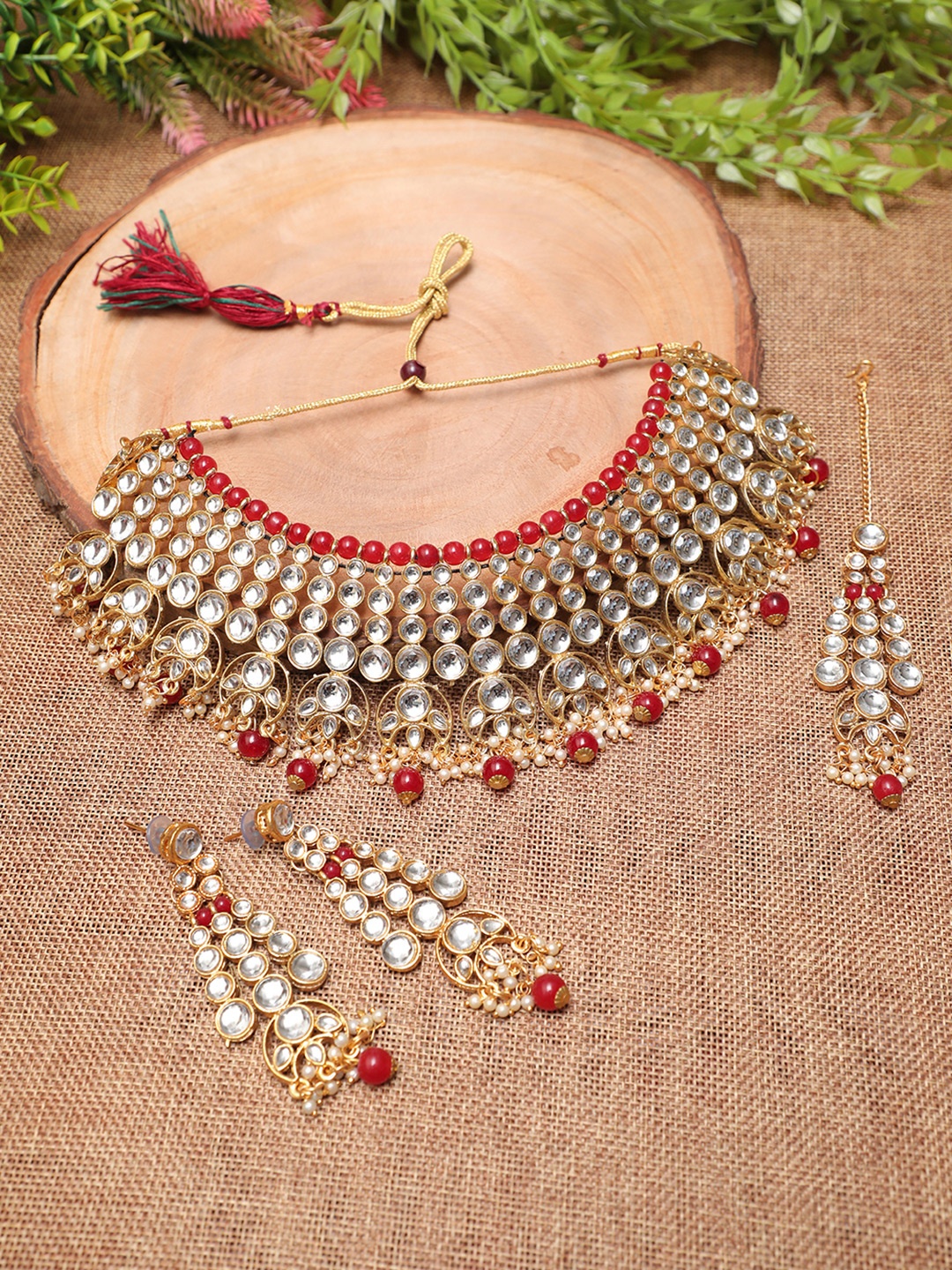 

Swarajshop Gold-Plated Red-Coloured White Kundan Studded Necklace Set