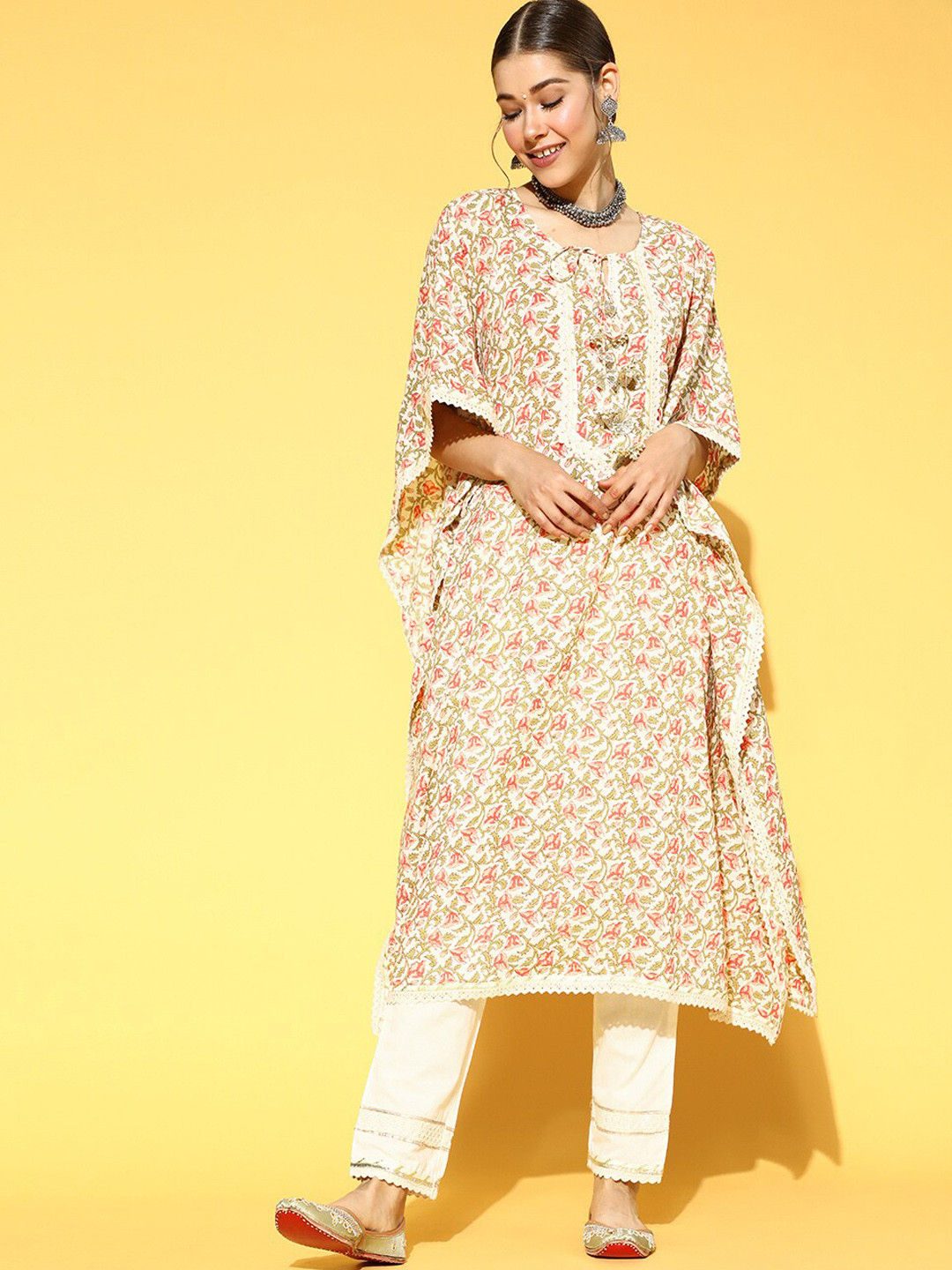 

Ishin Women White Floral Printed Panelled Thread Work Pure Cotton Kurta with Trousers