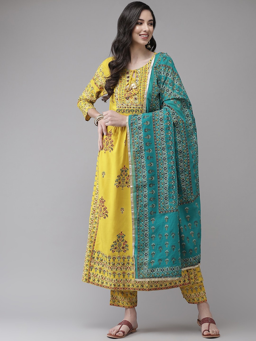 

Ishin Women Yellow Ethnic Motifs Printed Empire Kurta with Trousers & Dupatta