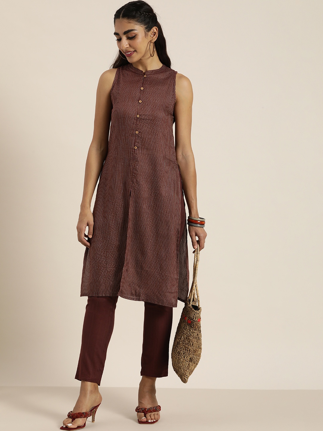 

Taavi Women Brown Striped Woven Legacy Kurta with Trousers