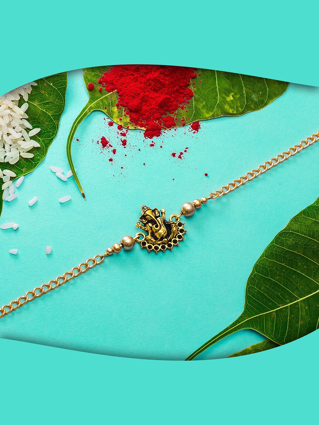 

aadita Men Gold-Toned Hand Made Lord Ganesh Rakhi with Rolli Chawal