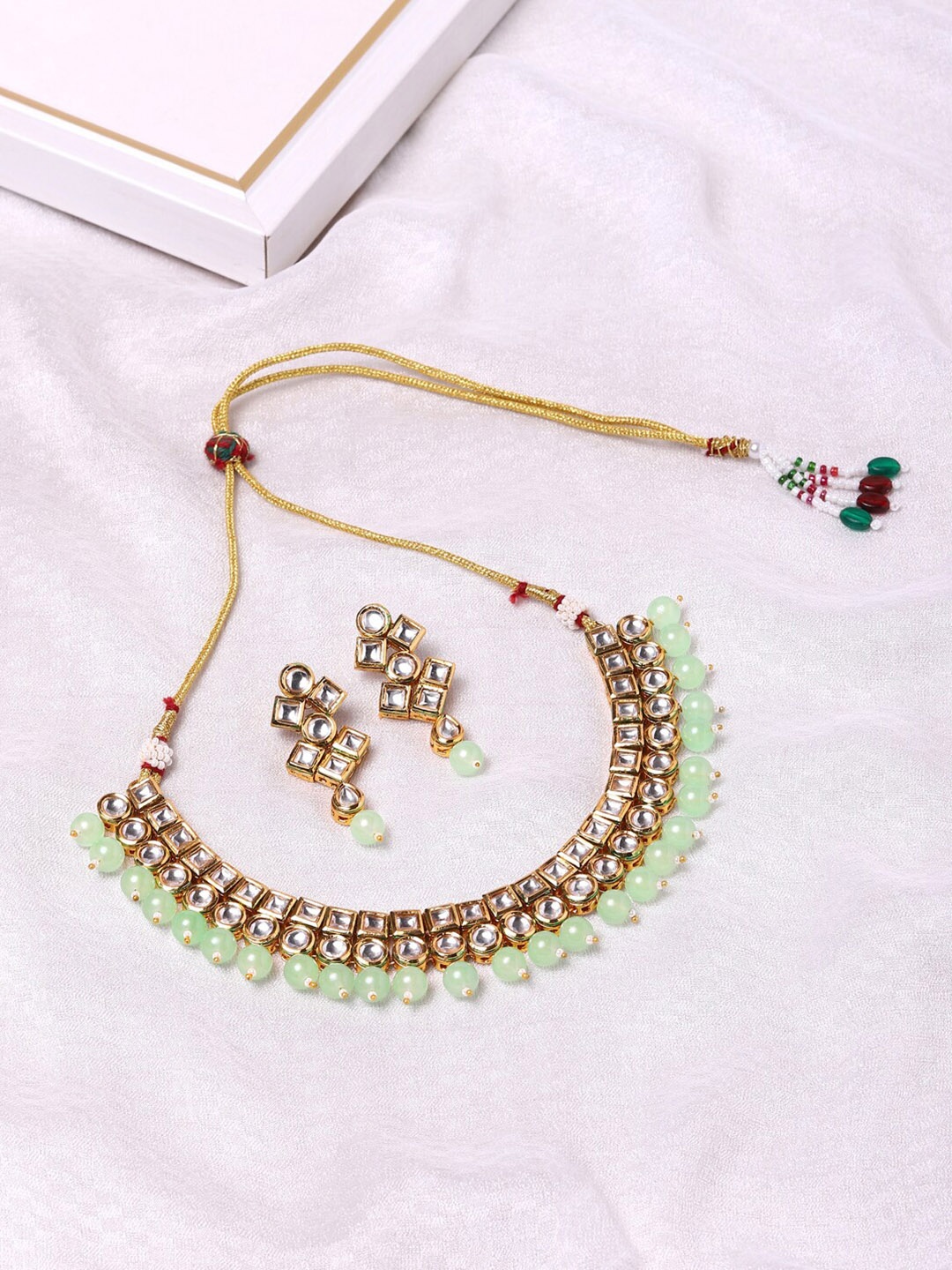 

Voylla womens Gold-Plated White & Green Kundan Studded & Beaded Brass Jewellery Set