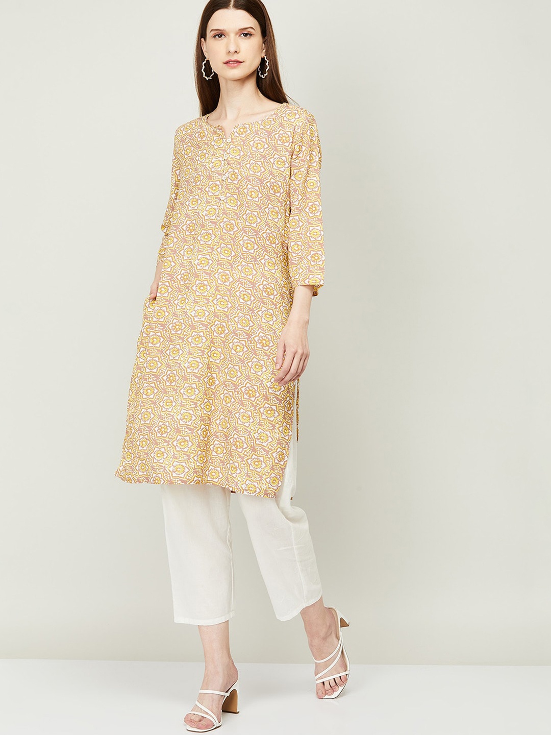 

Melange by Lifestyle Women Beige Printed Keyhole Neck Flared Sleeves Kurta