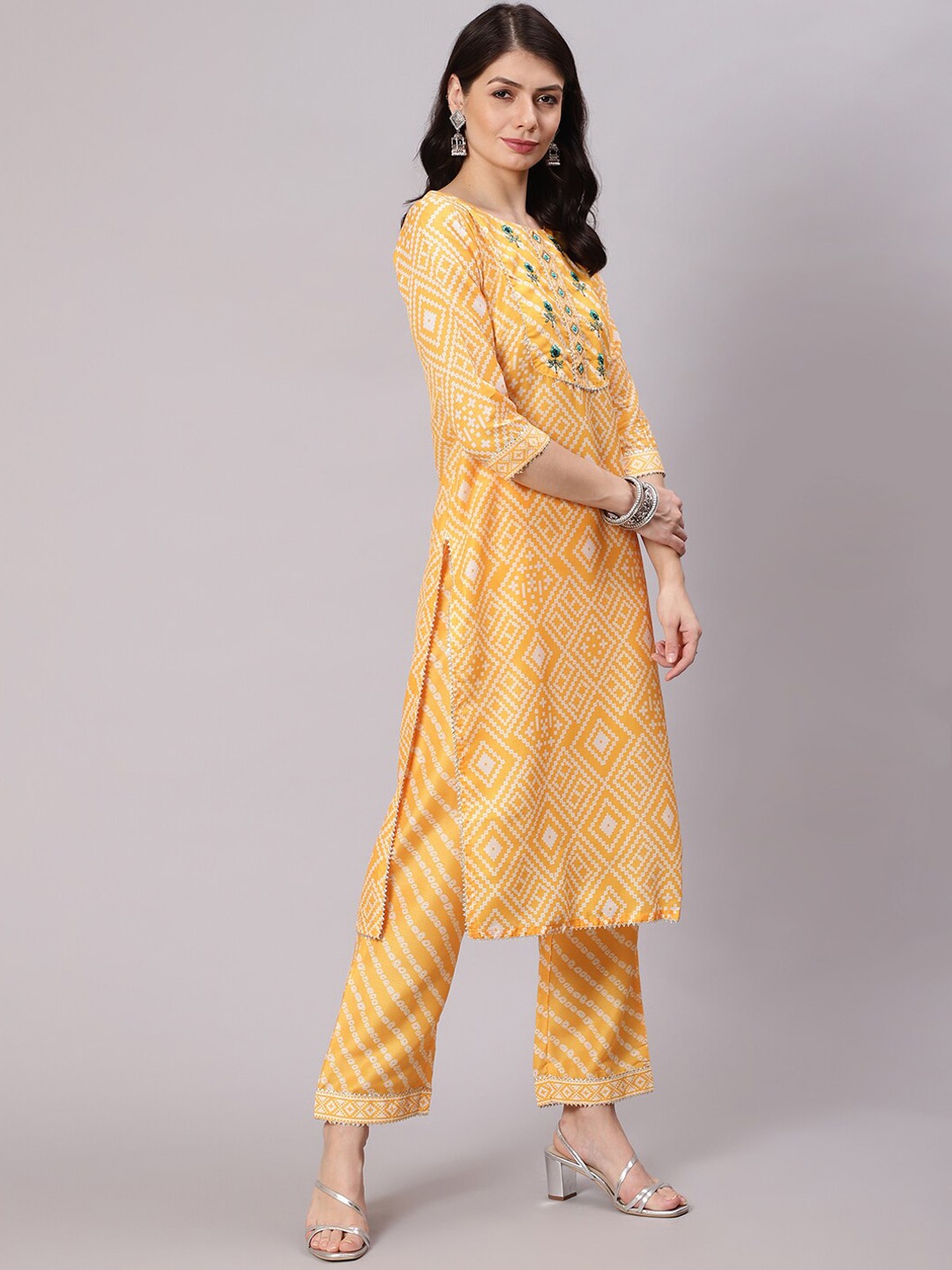 

Awadhi Women Yellow Bandhani Printed Thread Work Kurta with Trousers & With Dupatta