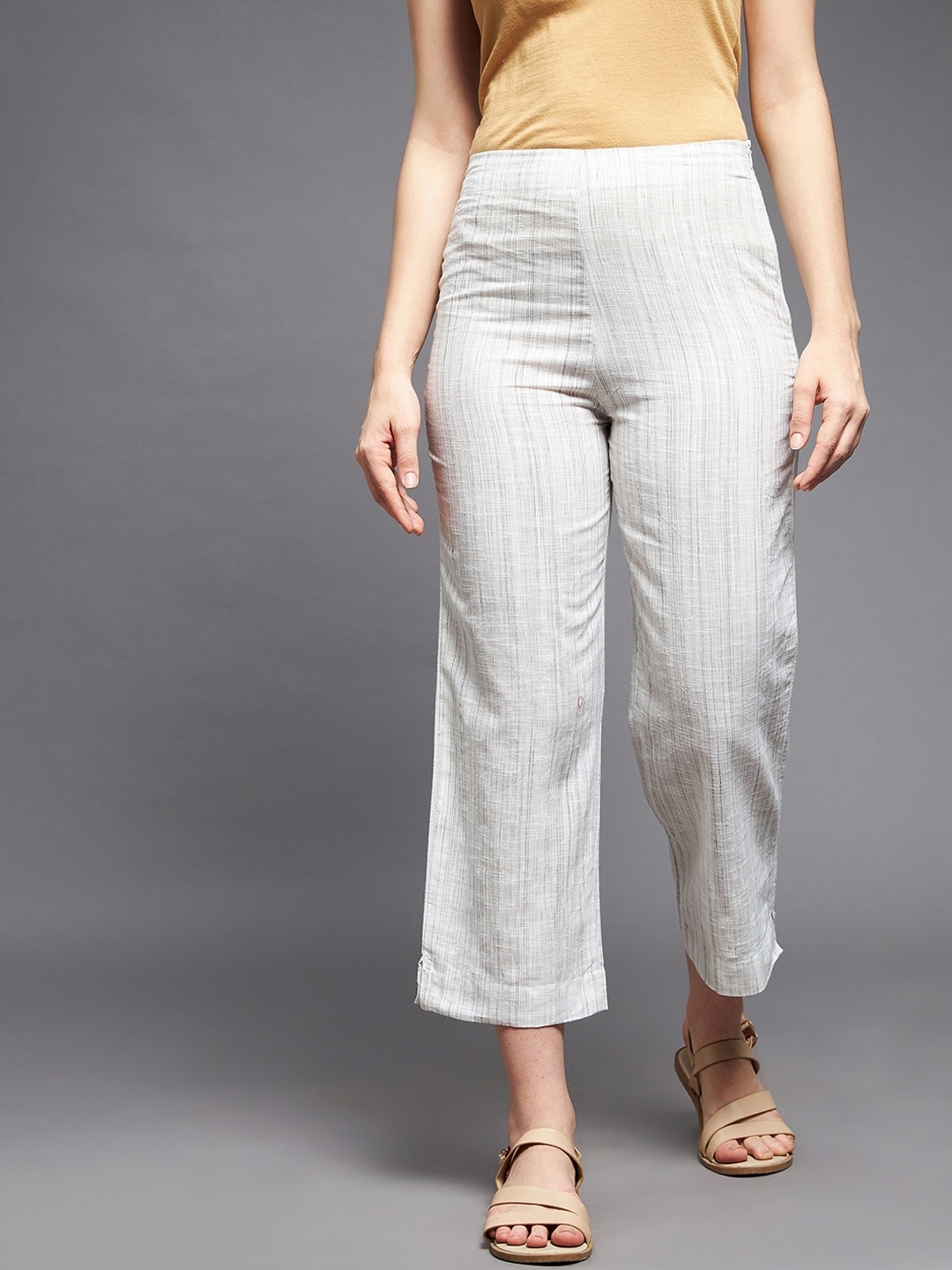 

Indian Dobby Women White Striped Straight Fit Trousers