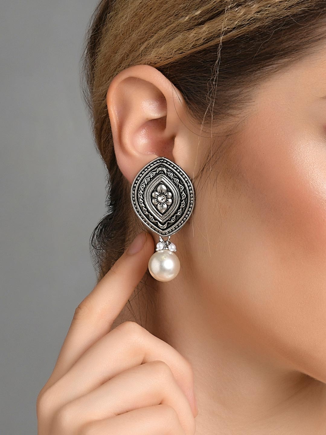 

Fida Women Silver-Toned Contemporary Studs Earrings