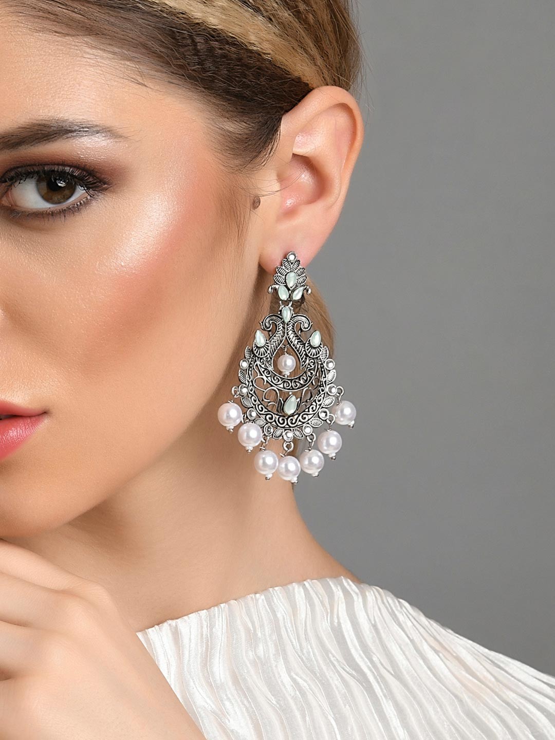 

Fida Women Silver Plated Kundan Pearl Drop Earrings