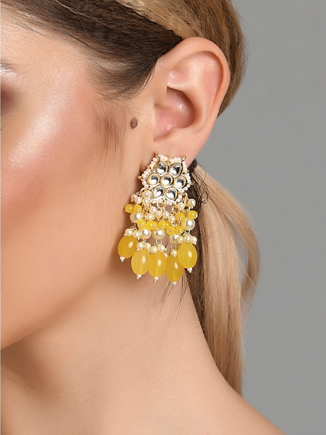 

Fida Gold-Toned & Yellow Contemporary Studs Earrings