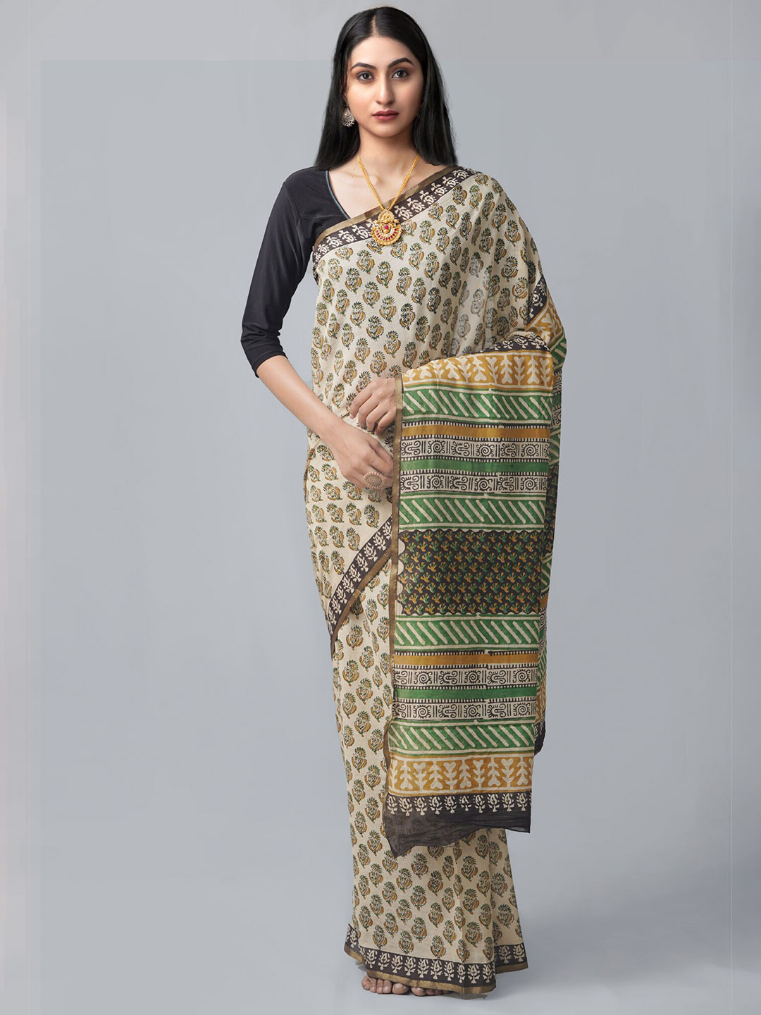

Unnati Silks Beige & Green Dabu Pure Cotton Dabu Saree