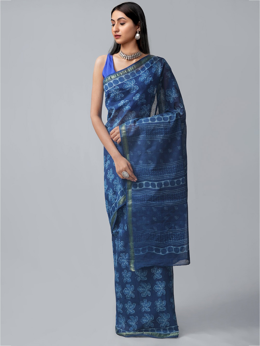 

Unnati Silks Blue & White Printed Pure Cotton Dabu Saree