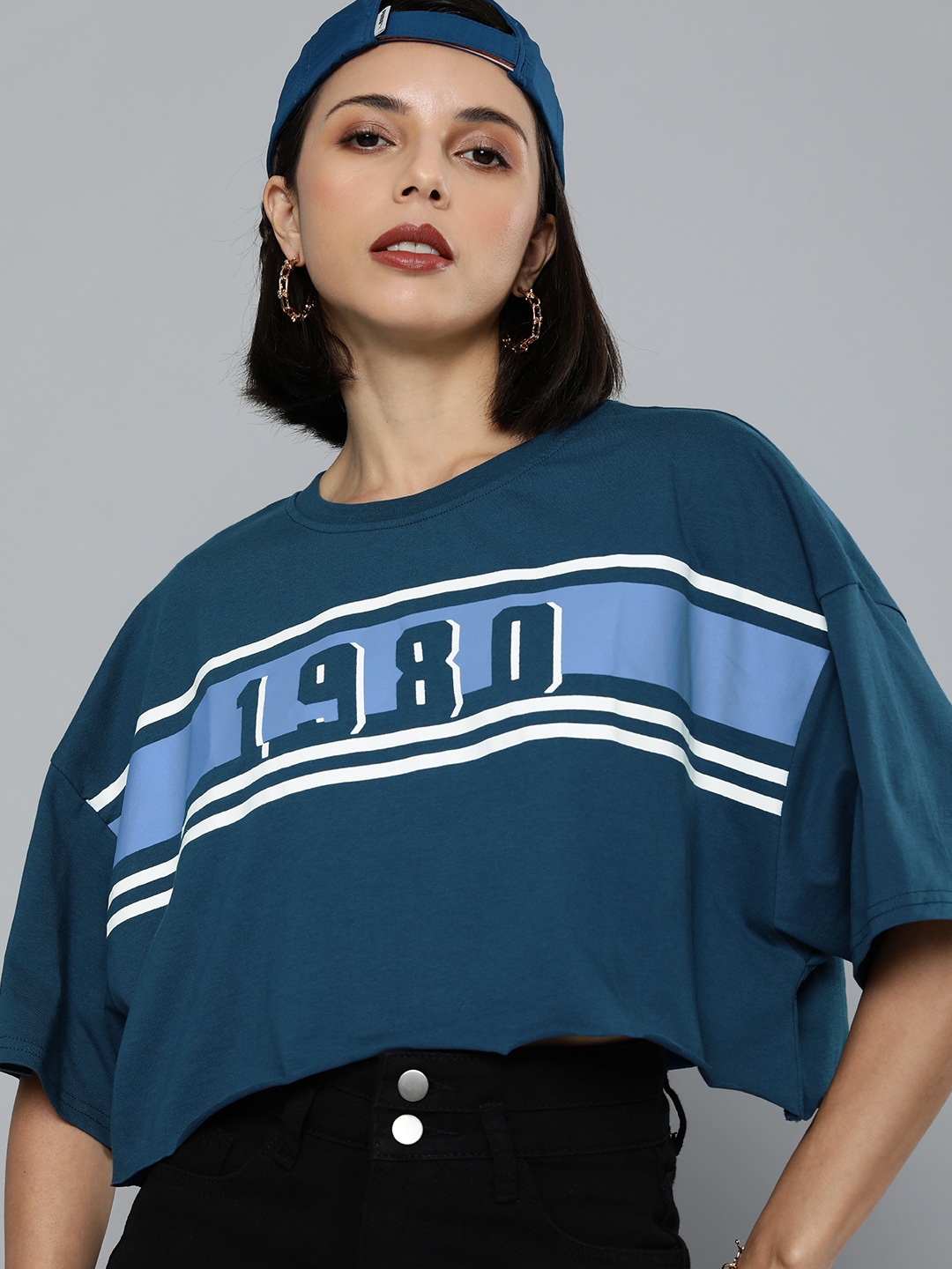 

Flying Machine Women Teal Blue Varsity Print Pure Cotton Boxy T-shirt